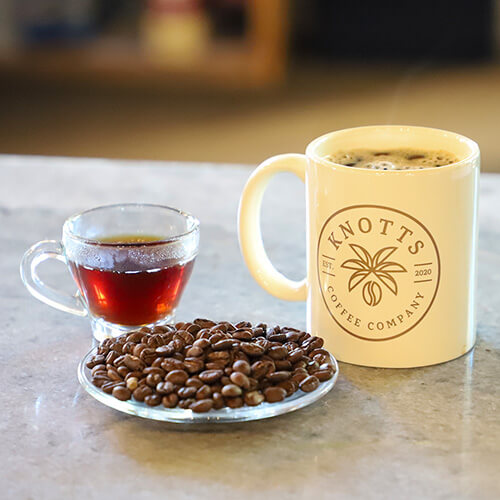 Coffee Beans with coffee mug and espresso